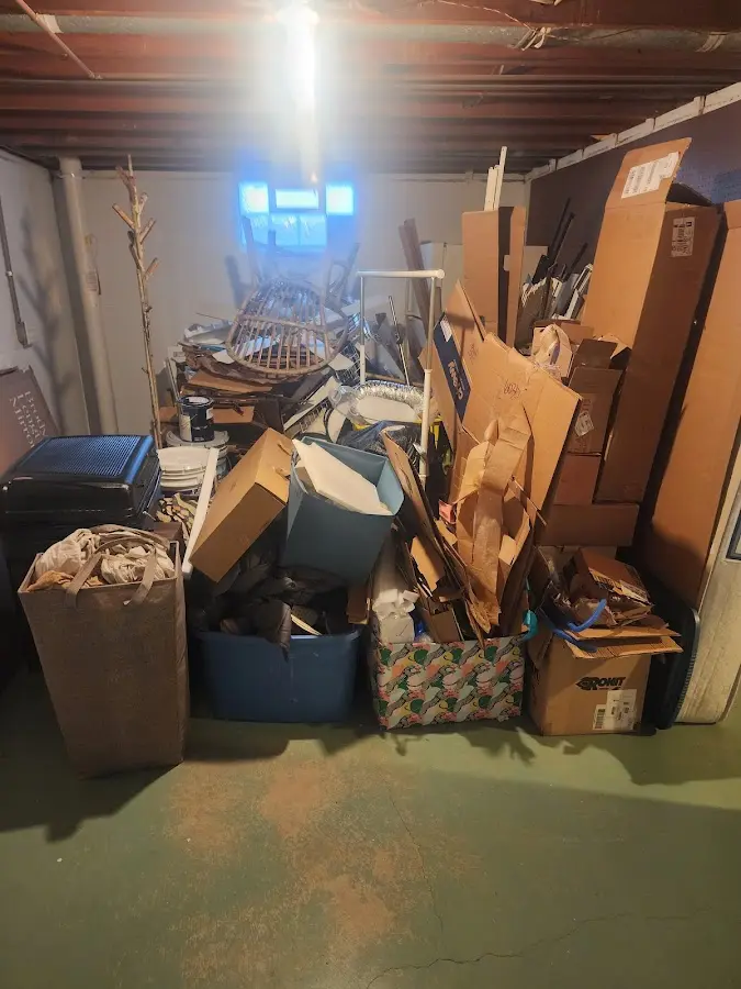 Roll-off dumpster container at job site for Yard Waste Dumpster Rental in North Sioux City